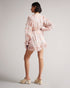 IRVETE-Trousers-Ideal for sunny walks along the river or enjoying a pub lunch, IRVETE is as easy to throw on as it is captivating. Finished with ruffles, this romper is a must-have for your summer wardrobe. Ted Baker womenswear collection Romper Soft ruffle detail Fully lined Our model is 5'9" / 1.75m and wears a Ted size 1- Ted Baker Romania